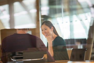 Business people talking in office meeting