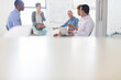 © Sam Edwards/KOTO - Group of business people having meeting in modern in office