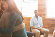 © Martin Barraud/KOTO - Women hugging at group therapy session