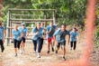 © Sam Edwards/KOTO - Team running on boot camp obstacle course