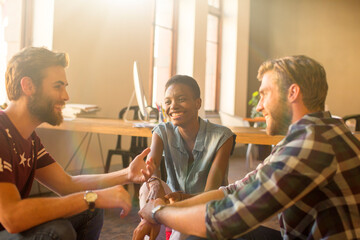 Wall Mural - Casual business people talking in meeting in office