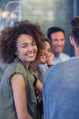 Portrait smiling woman hanging out with friends