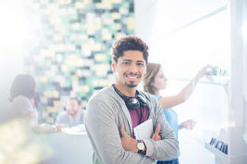 Wall Mural - Portrait confident creative businessman in office