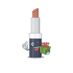 Sticker - joyful brown lipstick cartoon character with a big gift box