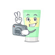 © kongvector - a professional photographer cleansing foam cartoon picture working with camera