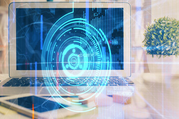 multi exposure of desktop computer and technology theme hologram. concept of software development.