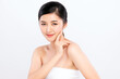 © kitthanes  - Beautiful Young asian Woman touching her clean face with fresh Healthy Skin, isolated on white background, Beauty Cosmetics and Facial treatment Concept.