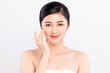 © kitthanes  - Beautiful Young asian Woman touching her clean face with fresh Healthy Skin, isolated on white background, Beauty Cosmetics and Facial treatment Concept.