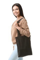 Wall Mural - Young woman with eco bag on white background