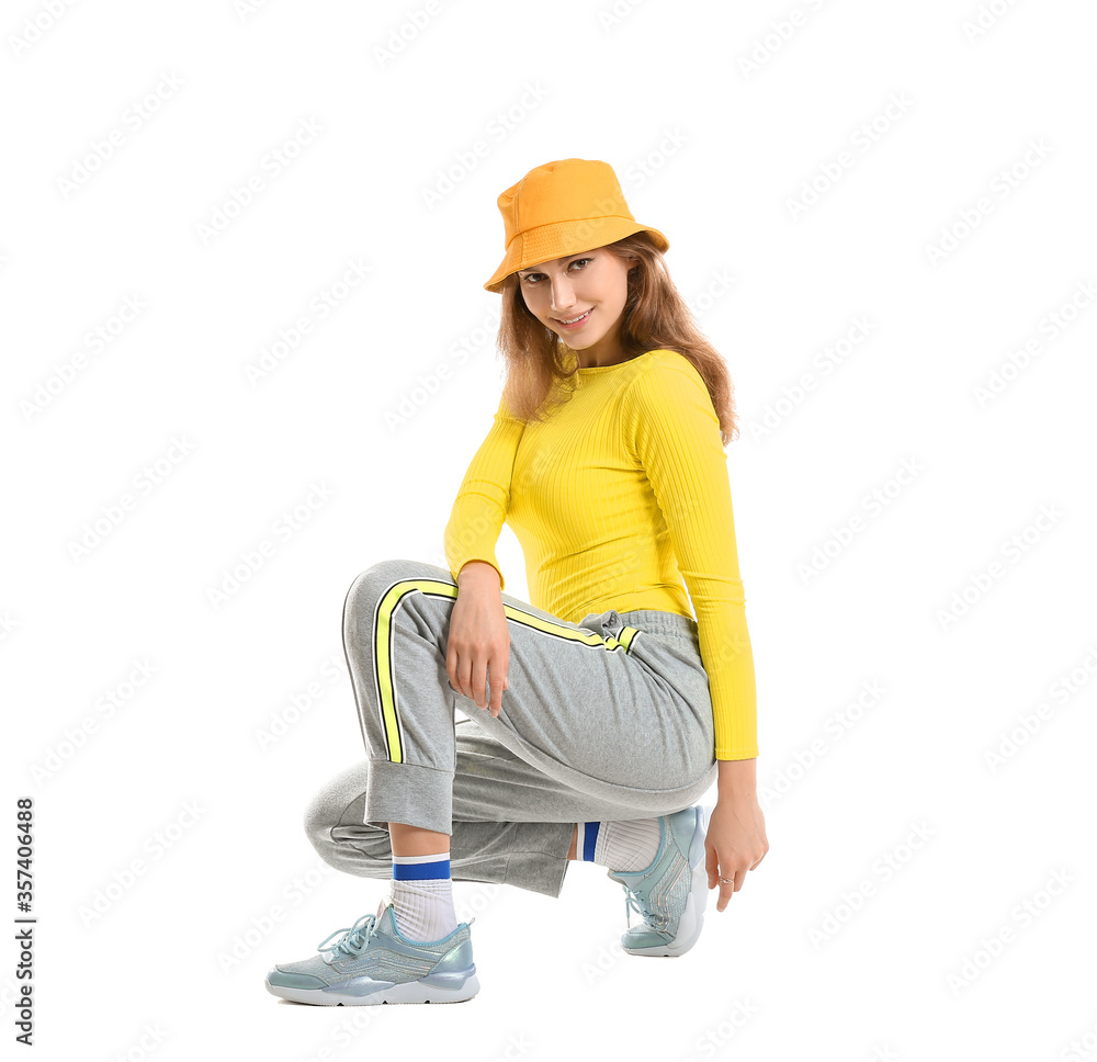 Beautiful female hip-hop dancer isolated on white