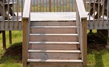 A Close View Of The Wood Steps On The Deck.