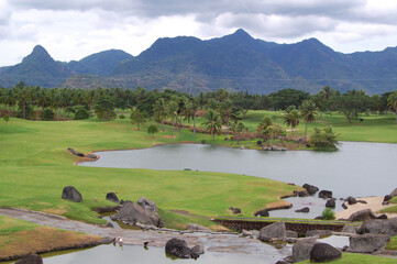 Golf course with trees, mountain, and lake at Mount Malarayat in Lipa, Batangas, Philippines