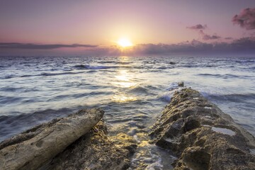 Poster - Beautiful scenery of rock formations in the sea during sunset