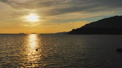 Wall Mural - Sunset time above the ocean, water surface at sunset time, nature background static shot