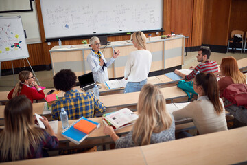 professor explaining the lecture to the students