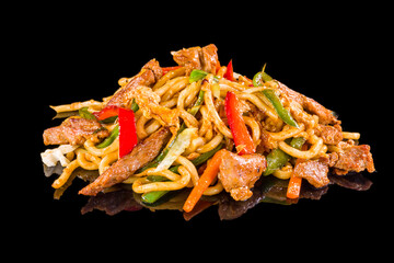 a gourmet udon noodles with duck with reflection, isolated on black background