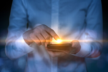 Woman use finger touch screen on smartphone with flare light.