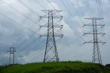 Electricity pylons and power lines.