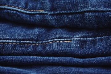 Close up of jeans fabric in a jeans pant. Jeans fabric texture.