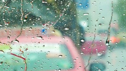 Sticker - Closeup shot of a car window with rain drops