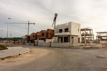 Poster - Buildings next to each other in the middle of a reconstruction