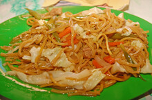 Pancit Noodles With Mixed Vegetables On Plate Serve In The Eatery In Philippines