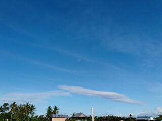 Wall Mural - Blue sky background with white clouds