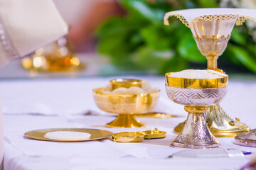 Wall Mural - altar with host and chalice with wine in the churches of the pope of rome, francesco