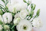 Fototapeta Tulipany - Bouquet of white flowers on white background