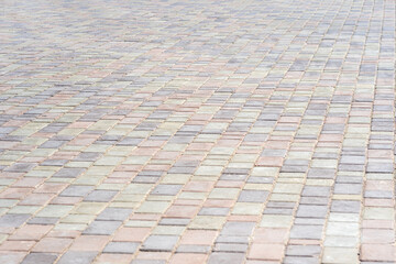 Wall Mural - Perspective view of the paving stones, selective focus.