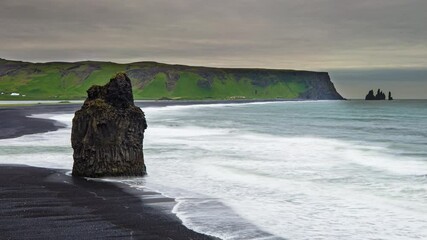 Wall Mural - Reynisfjara Beach view point Dyrholaey. Famous Iceland black sand beach on South Iceland. Icelandic nature landscape tourist attraction destination. 4K.