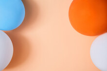 Holidays Background. Happy Birthday Concept. Children Party. Bright Orange, White Balloons On Blue Backdrop, Copy Space