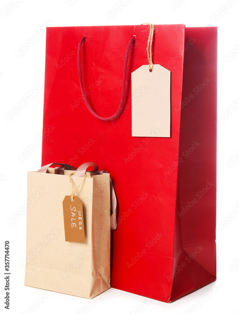 Paper shopping bags on white background