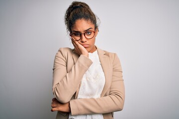 Poster - Beautiful african american businesswoman wearing jacket and glasses over white background thinking looking tired and bored with depression problems with crossed arms.