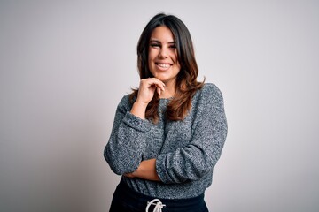 Poster - Young beautiful brunette woman smiling happy and confident. Standing with smile on face wearing casual sweater over isolated white background