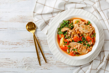 Wall Mural - white bean, vegetables pork stew in a bowl