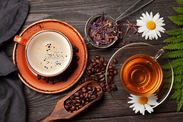 Wall Mural - Herbal tea in teapot and cup and espresso coffee