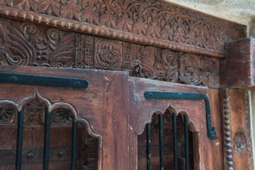 Wall Mural - Old wooden door of a building