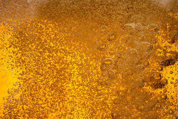 Wall Mural - Close up beer bubble foam in glass textue alcohol background