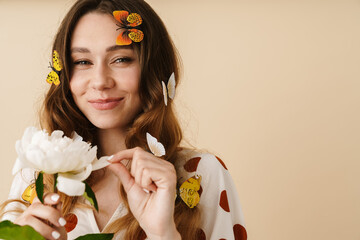 Poster - Photo of pleased woman with peony looking at camera