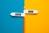 Fototapeta  - Pencil - direction indicator - choice of now or later.
