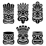 Fototapeta Młodzieżowe - Hawaiian and Polynesia Tiki head totem vector design set- tribal folk art background