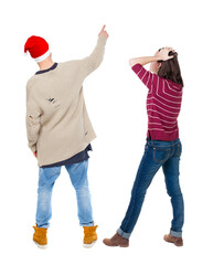 Canvas Print - Back view of couple in sweater pointing.