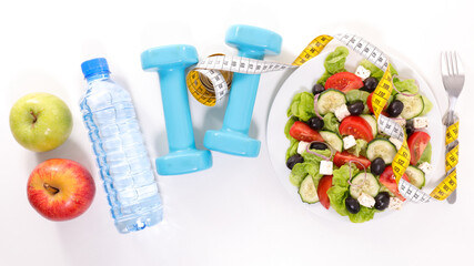 Wall Mural - vegetable salad with dumbbell, water, apple and meter tap on white background- diet food concept