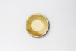 Round Areca Leaf Bowl, eco-friendly disposable cutlery. Top view on a white background.