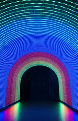 Poster - Tunnel with illuminated colorful LED lighting. Architecture abstract background