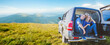 © oksix - Family sitting in car trunk while journey to mountains