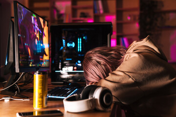 Wall Mural - Image of exhausted girl sleeping on table while playing video game