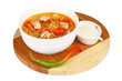 Vegetable soup with pepper and sour cream on the wood table