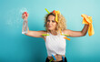© alphaspirit - Funny housewife cleans and disinfects to keep germs, viruses and bacteria away.